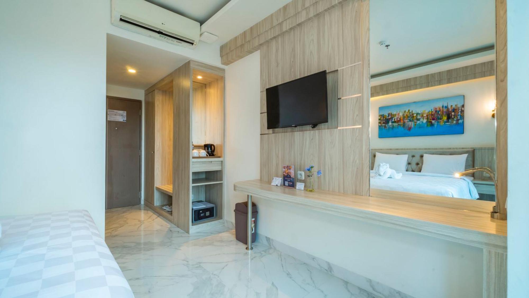 City Of Aventus Hotel - Denpasar Oda fotoğraf